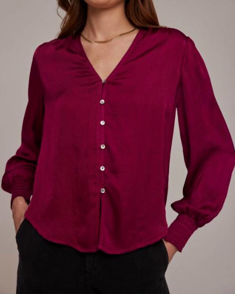 Front of a model wearing a size large Smocked Cuff Button Down in Dark Fuchsia in Dark Fuchsia by Bella Dahl. | dia_product_style_image_id:346963